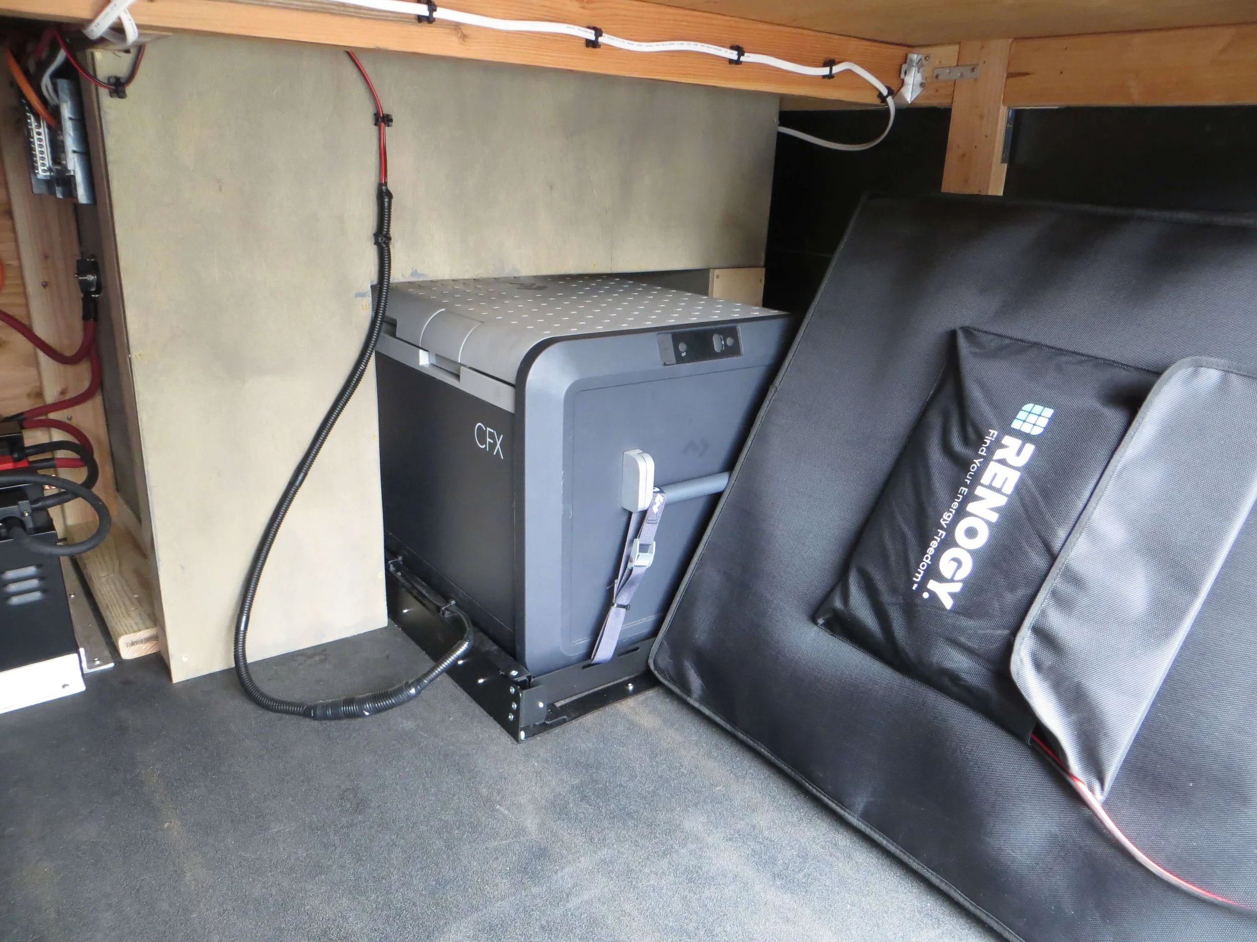 A Renogy portable solar generator in a workspace, Example of RV Solar Install near San Diego.  Lithium Battery, DC/DC Converter, LiFePO4, Inverter, install on RV near San Diego, CA.
