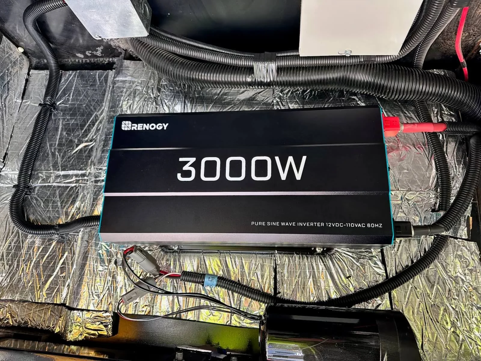 A 3000-watt pure sine wave inverter with the brand Renogy, Example of RV Solar Install near San Diego.  Lithium Battery, DC/DC Converter, LiFePO4, Inverter, install on RV near San Diego, CA.