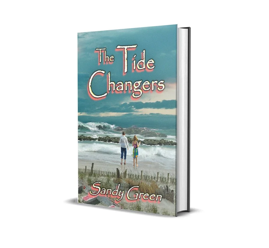 Two children on a beach with crashing waves