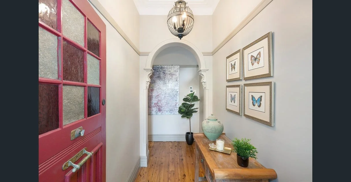 mark hanging artworks.jpeg