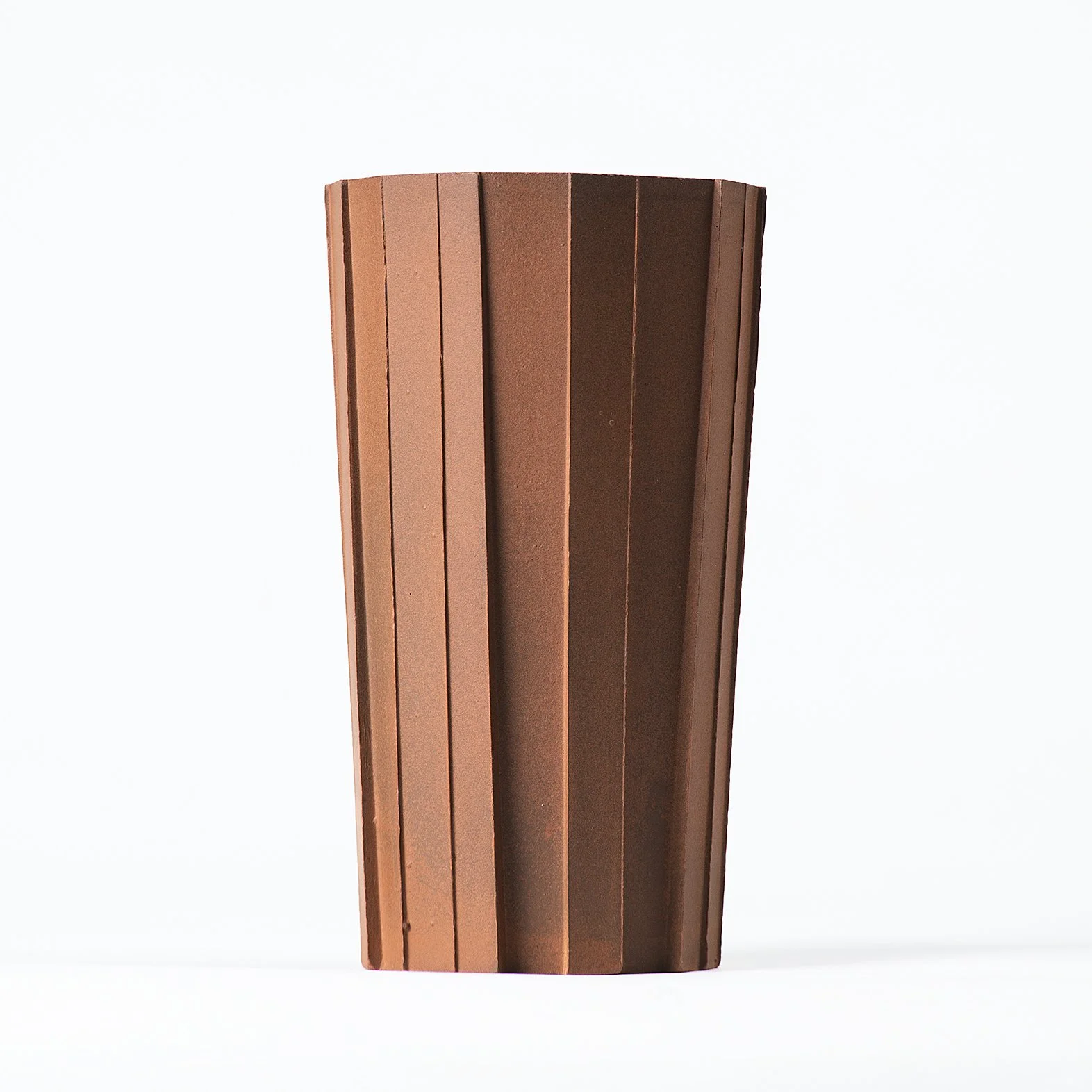 Handmade brutalist faceted ceramic tumbler, unglazed red stoneware, by Lea & Nicolas