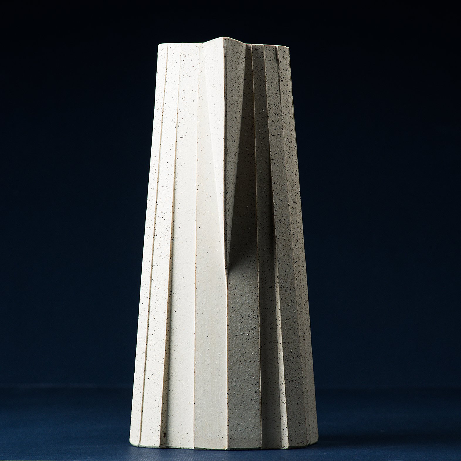 Handmade faceted ceramic pitcher in speckled white stoneware, by Lea & Nicolas