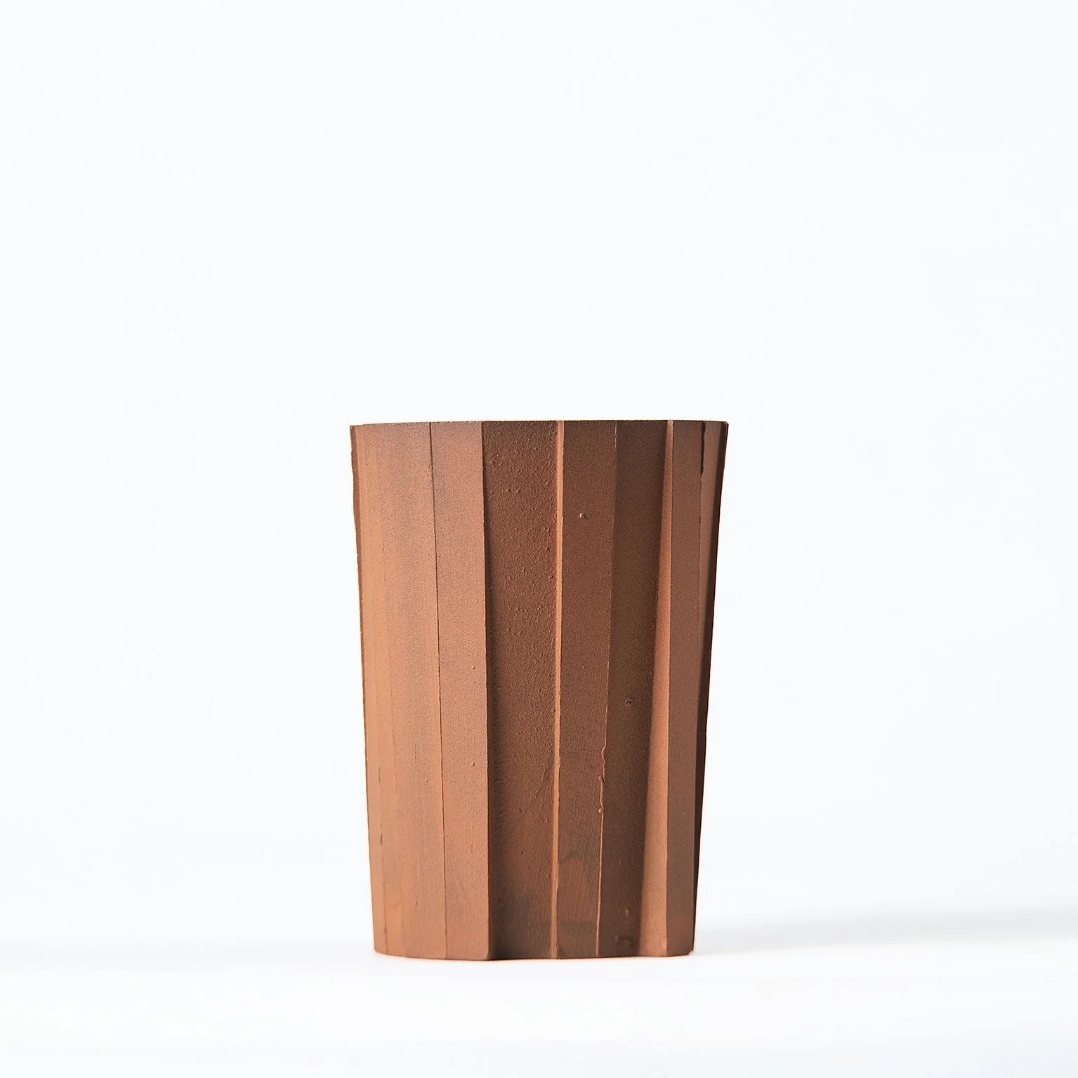 Handmade brutalist faceted ceramic tumbler, unglazed red stoneware, by Lea & Nicolas
