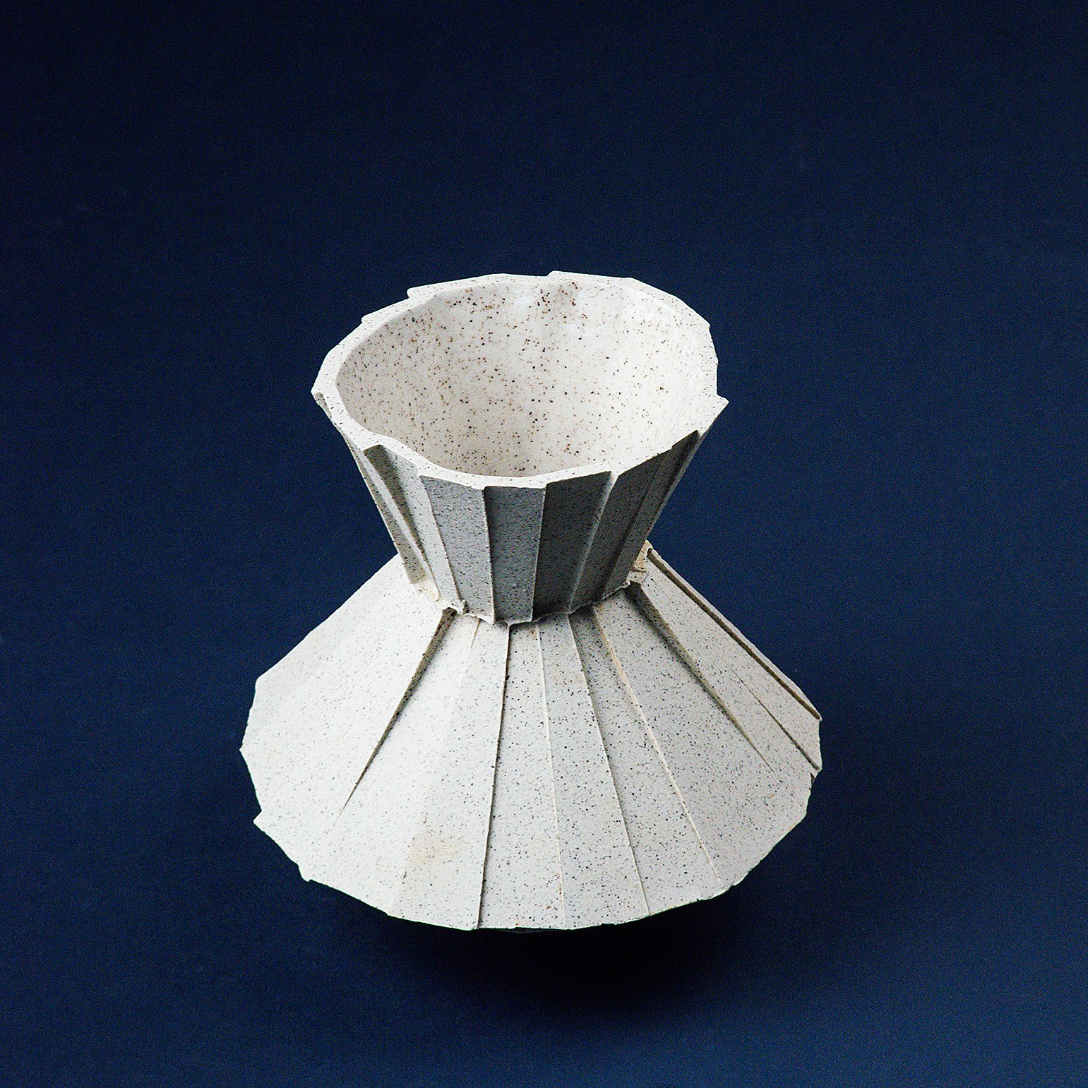 Handmade brutalist faceted ceramic carafe in speckled stoneware, by Lea & Nicolas