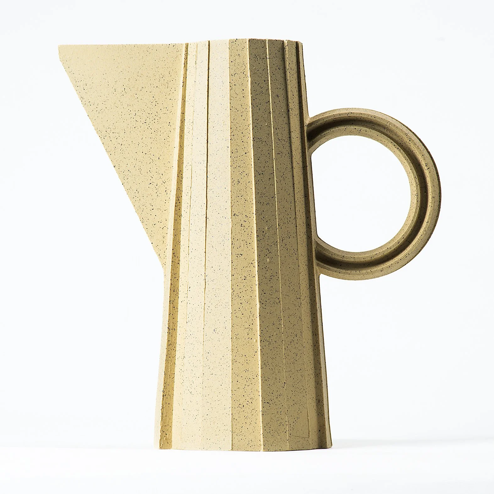 Handmade brutalist faceted ceramic pitcher in speckled yellow stoneware, by Lea & Nicolas