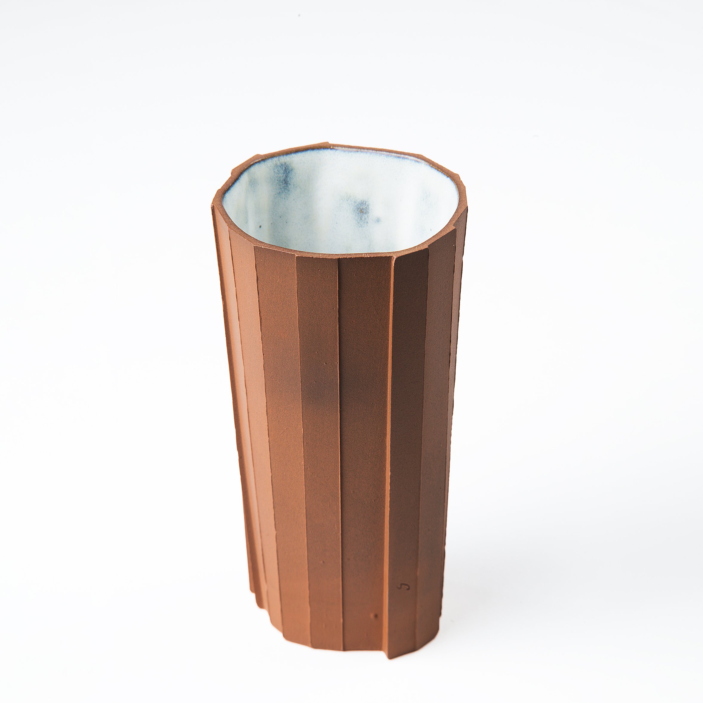 Handmade brutalist faceted ceramic tumbler, unglazed red stoneware, by Lea & Nicolas