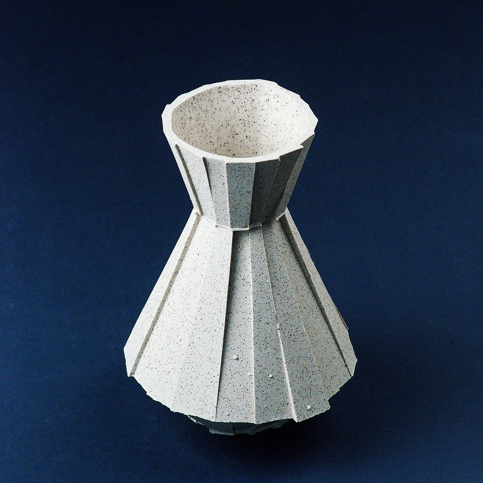 Handmade brutalist faceted ceramic carafe in speckled stoneware, by Lea & Nicolas