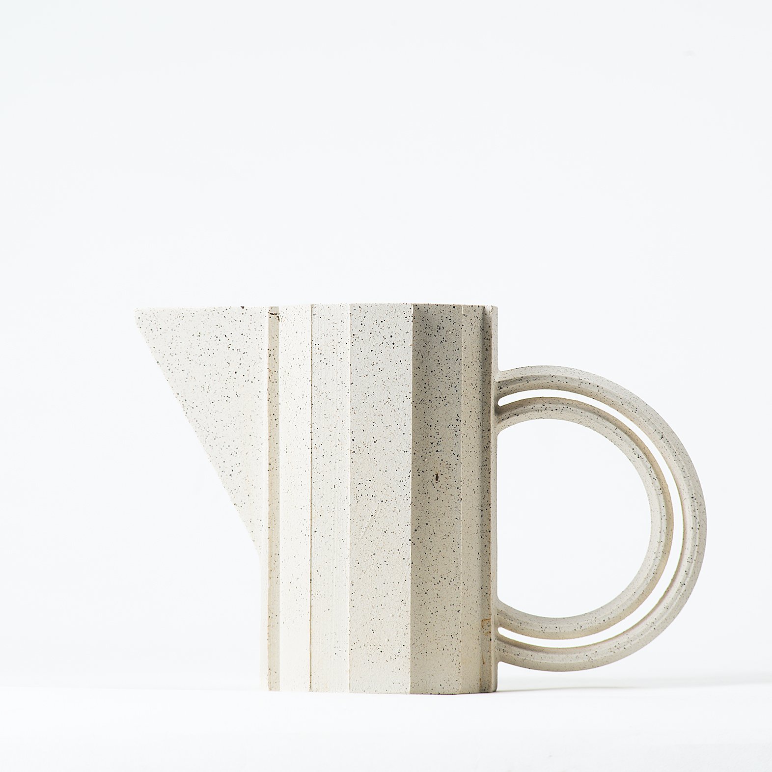 Handmade brutalist faceted ceramic pitcher in speckled stoneware, by Lea & Nicolas