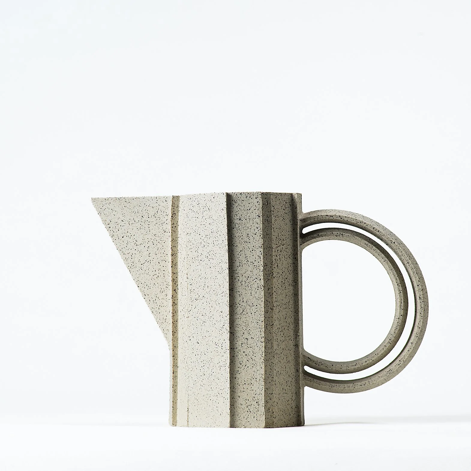 Handmade brutalist faceted ceramic pitcher in speckled stoneware, by Lea & Nicolas