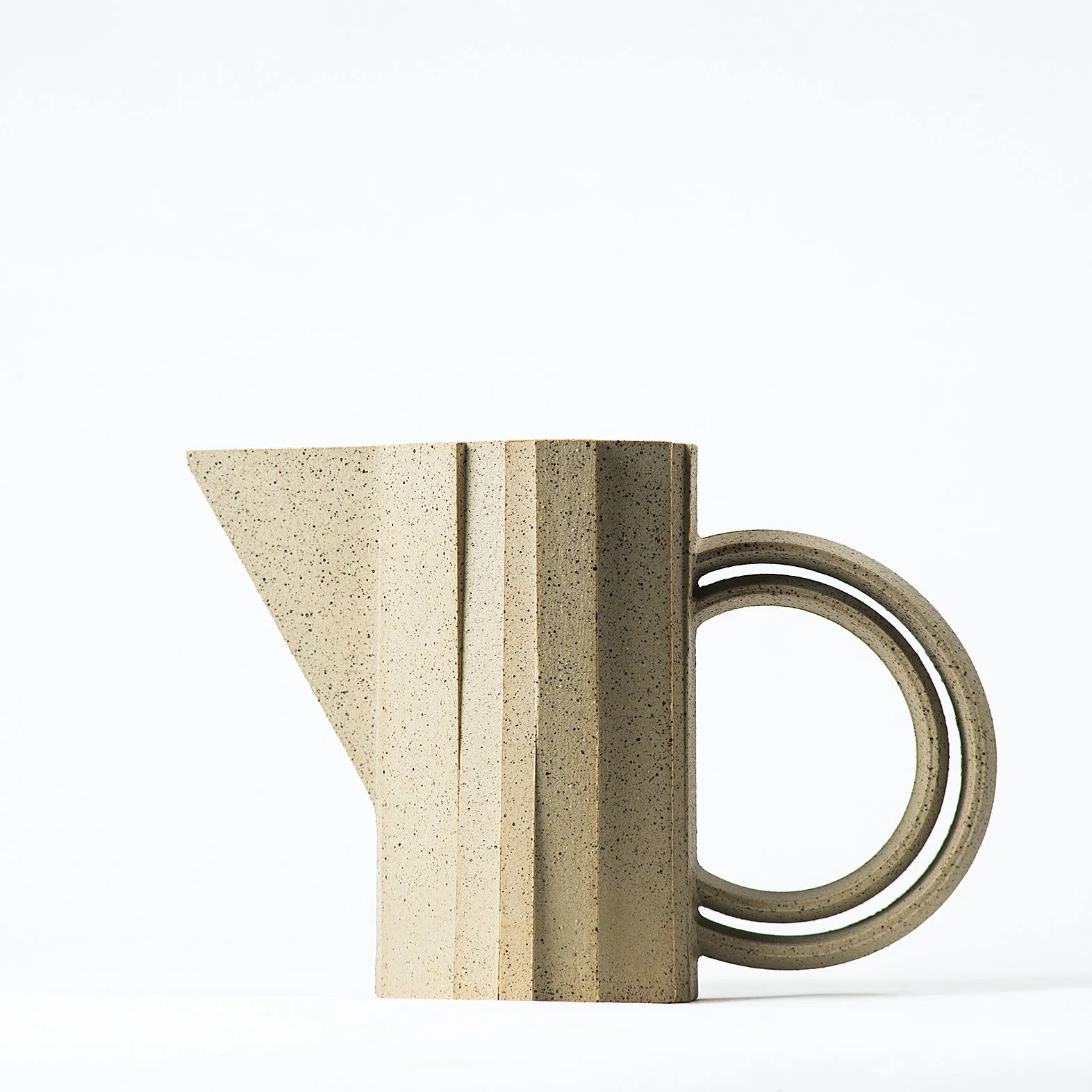 Handmade brutalist faceted ceramic pitcher in speckled stoneware, by Lea & Nicolas