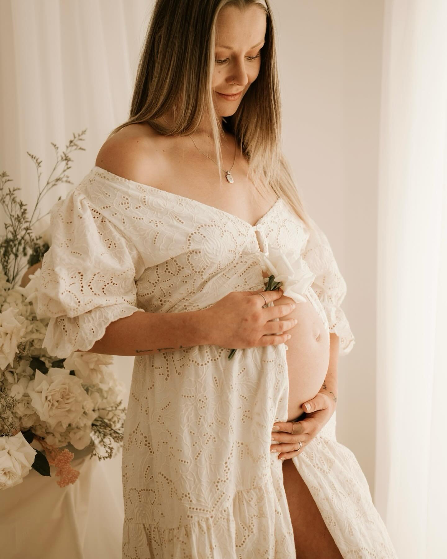 Studio maternity sessions are becoming a favourite of mine. You guys requested more of my pregnancy journey and i wanted to capture my newest client wardrobe dress, so here you go. Captured at the end of minis on the weekend. Bumps &amp; florals 🫶🏼