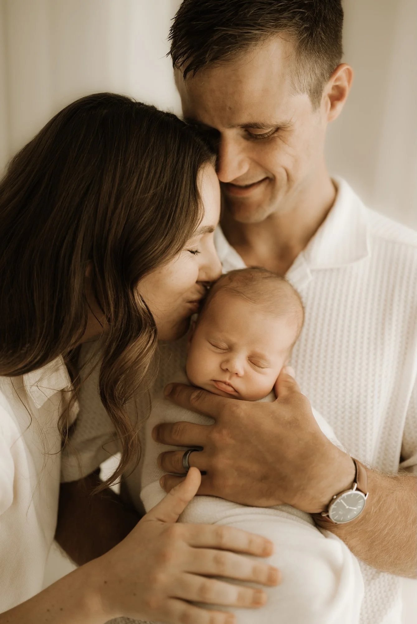 First time parents during a newborn photo shoot. Timeless, dreamy, calm, effortless newborn photography. For the mother who wants to remember it all, she wants to remember how small her baby was in the beginning. Echuca Newborn Photographer.