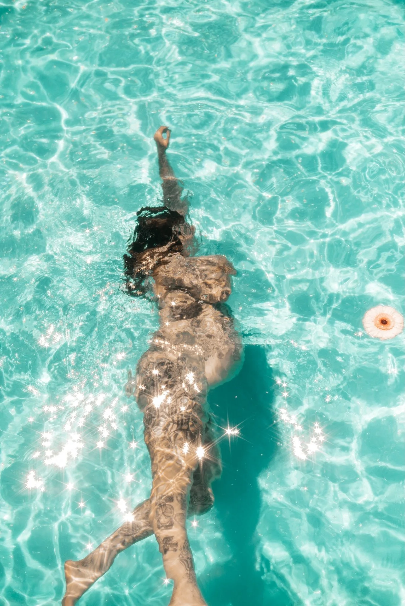 A pregnant mother during a mermaid maternity photo shoot. The mother who wants to remember it all, she wants to remember how it felt to carry life within her. Empowering, luxurious maternity photography. Echuca maternity photographer. 