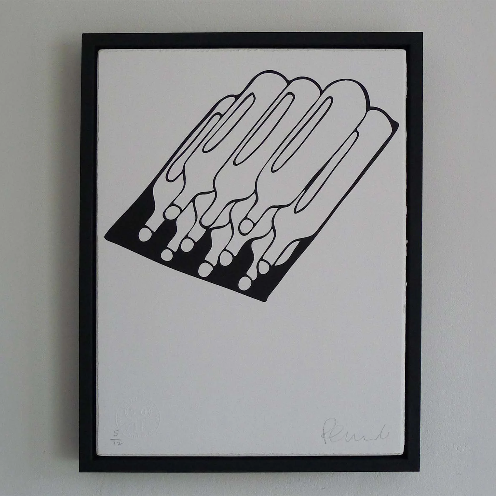 Framed black and white abstract print of a stylised stack of wine bottle