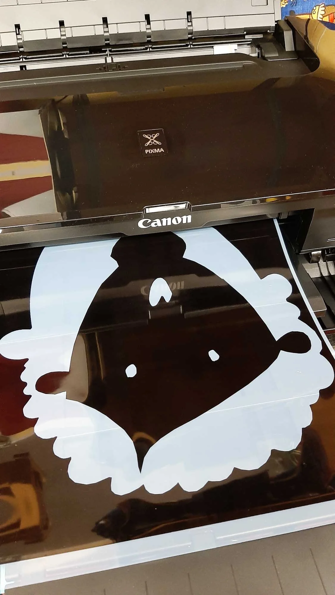 A Canon printer printing a silkscreen positive