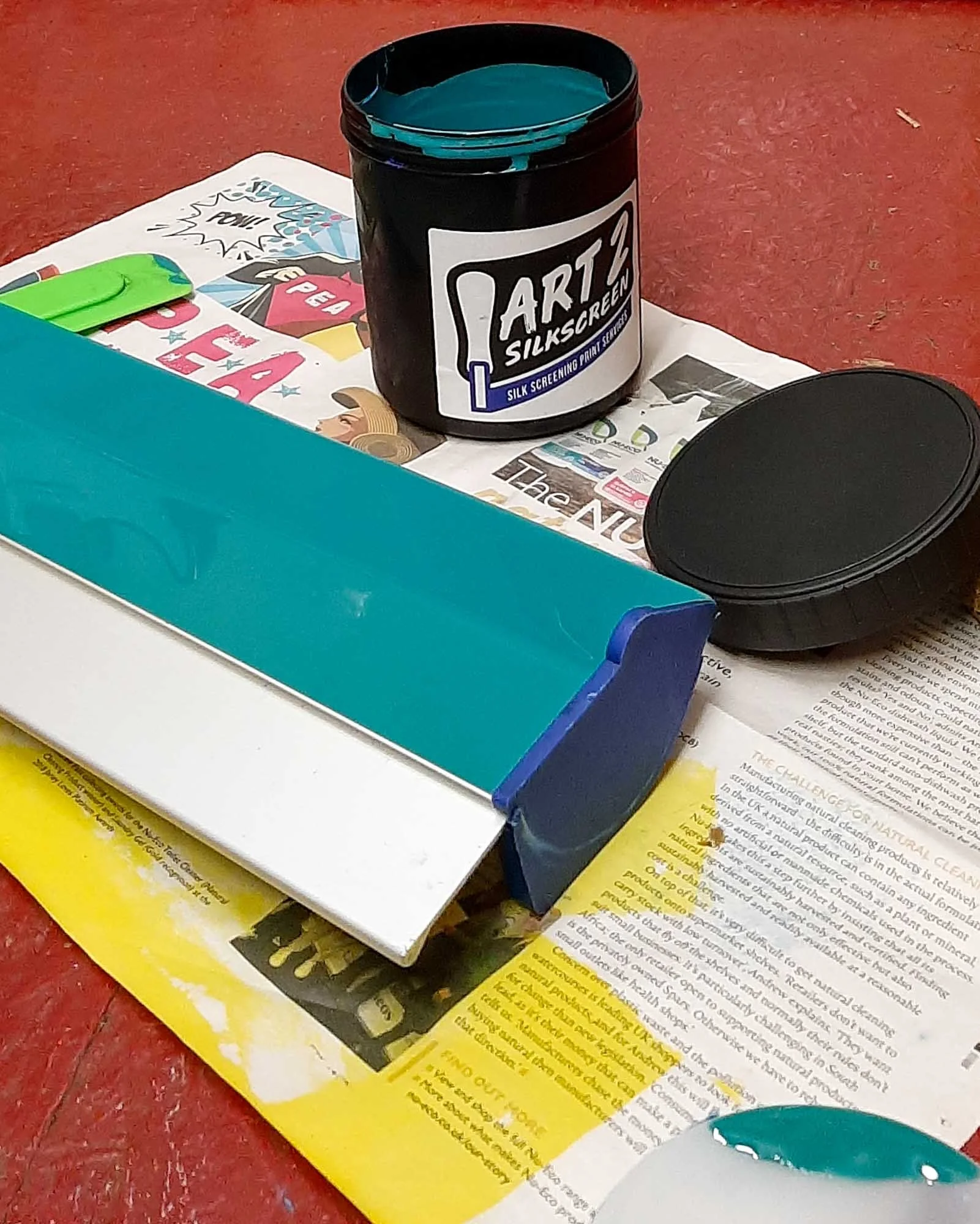 Aluminium coating tray filled with photo emulsion, ready to coat a silkscreen frame.
