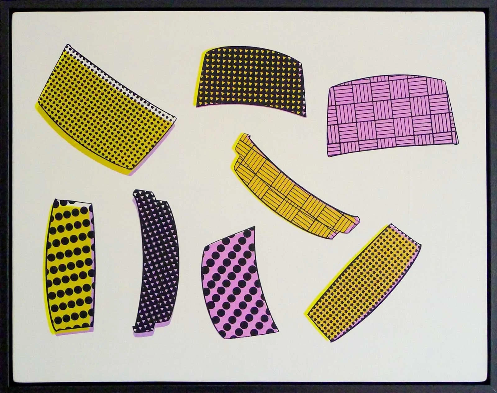 Several colorful, patterned shapes arranged randomly on an off- white background.