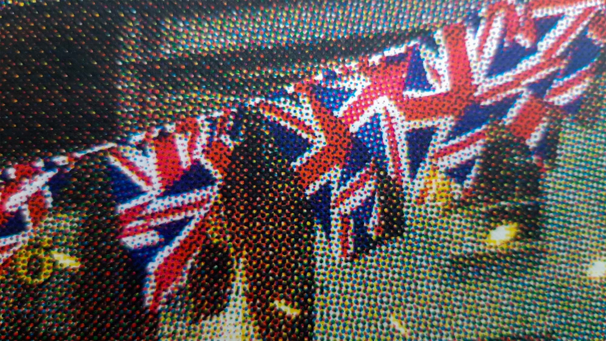 Close up of Union Flags within silkscreen print, showing layering of the CMYK print