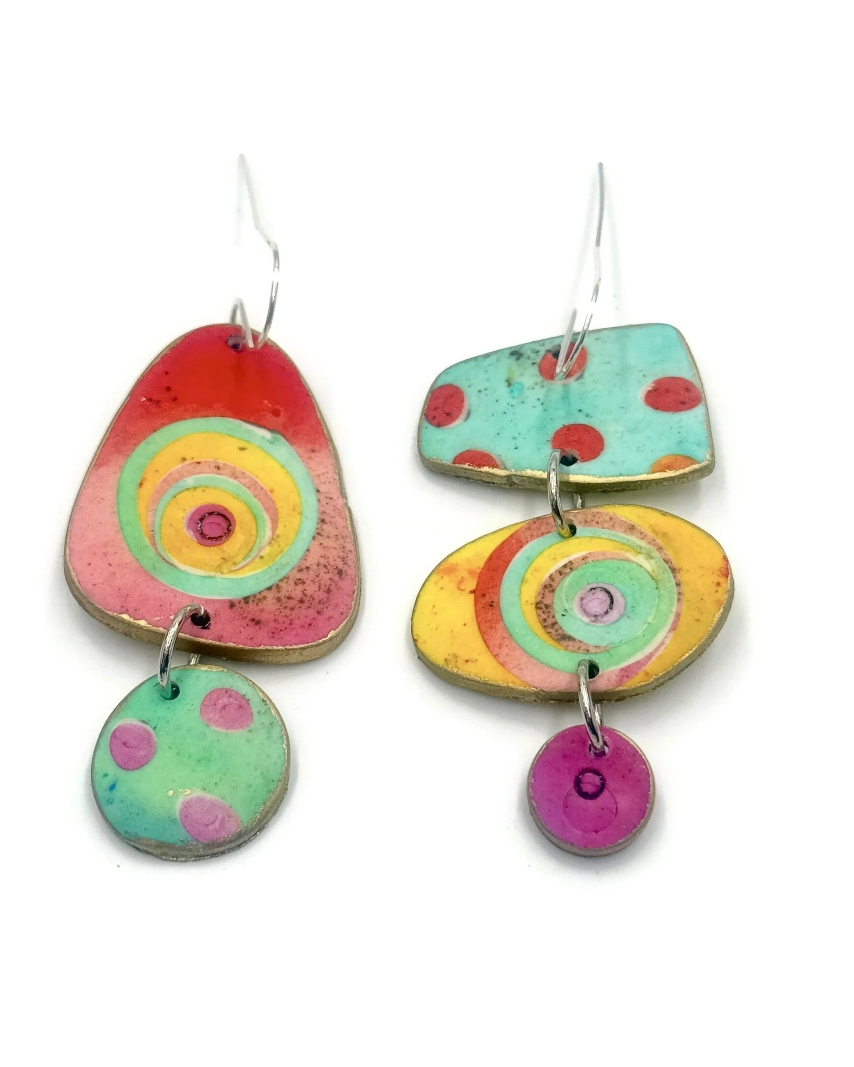 Colorful handmade earrings with geometric shapes and dots. Lightweight, fun, and one of a kind.