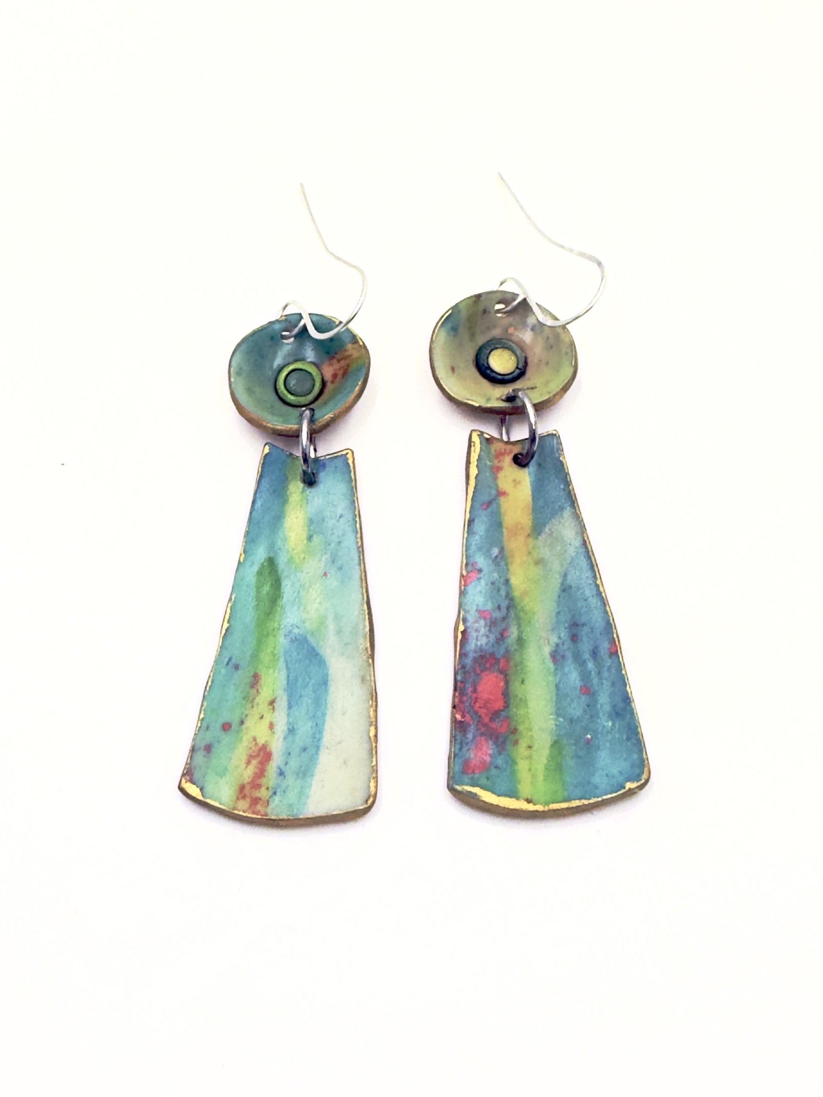 Handmade long trapeze earrings in green and blue tones with soft blended colors