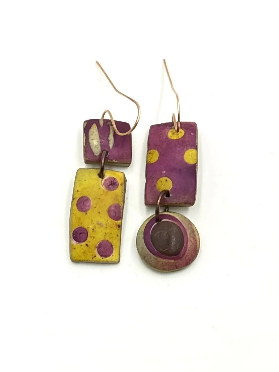 Handmade geometric drop earrings in mustard yellow, plum, and brown tones with dot details and playful abstract patterns