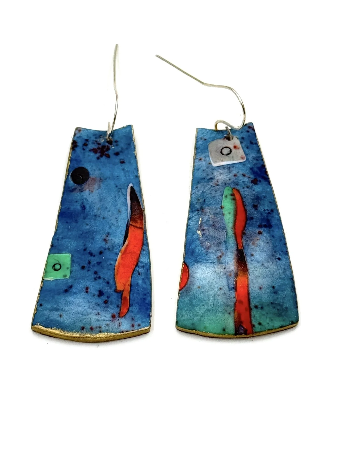 Handmade abstract statement earrings in layered blue tones with orange and green details, painterly textures, and silver-plated ear wires.