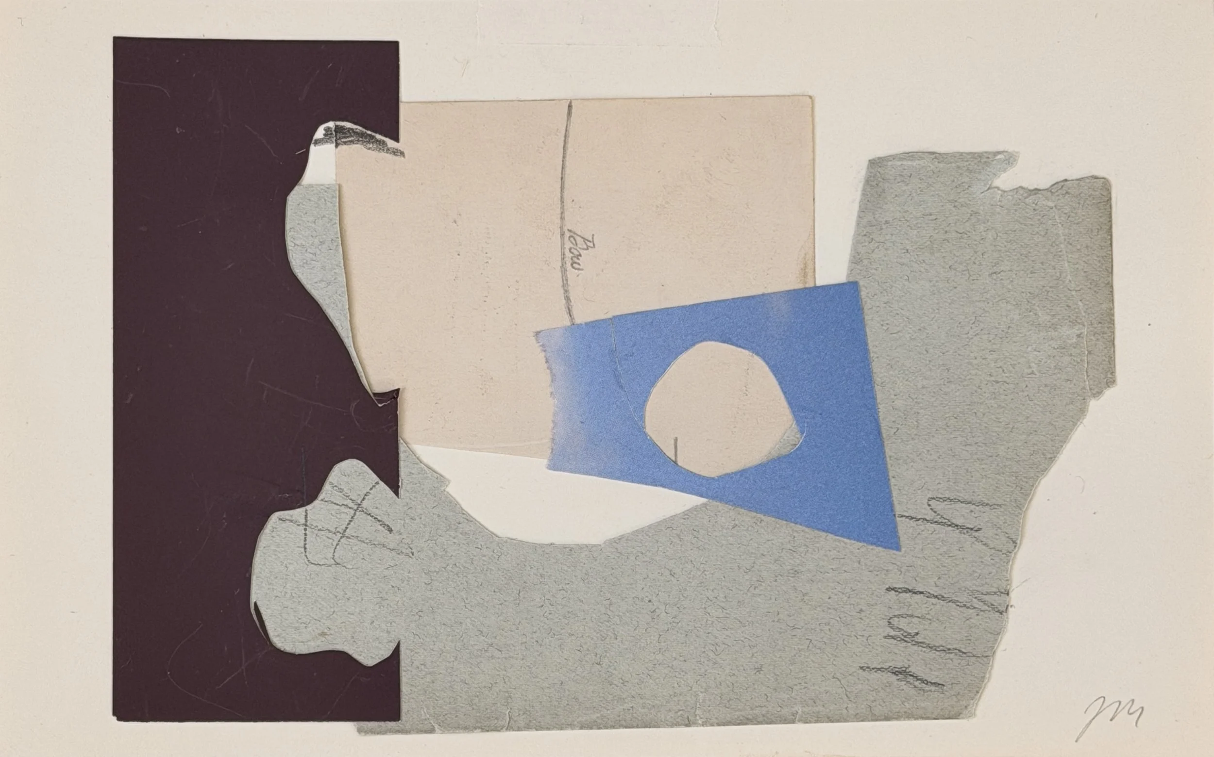 Mixed torn paper pieces in various colors and textures, layered together on a white background.