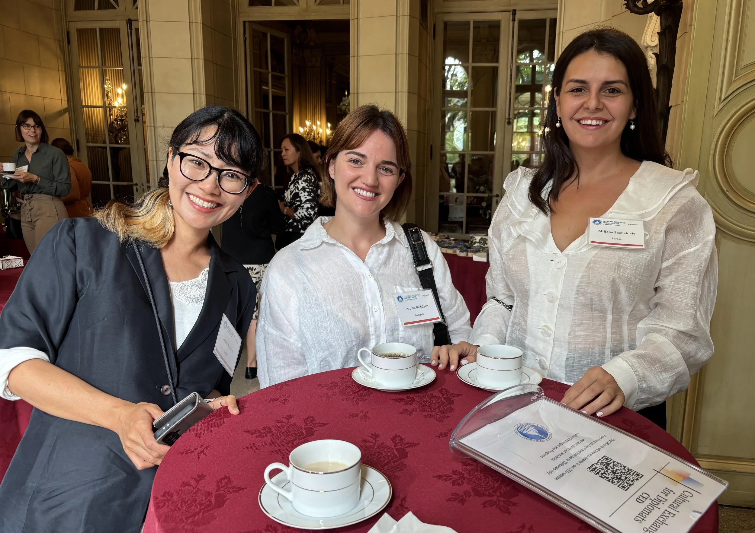 3 diplomats smiling.jpeg