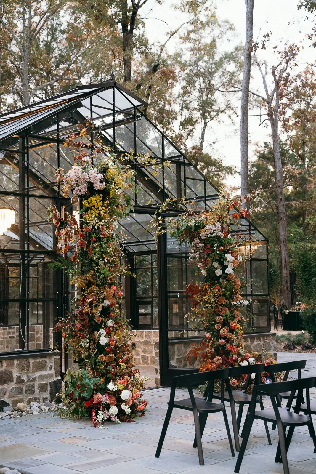 Floral arbor installation by Spruce & Co on the greenhouse at Morning Glory Farms, Charlotte, NC.