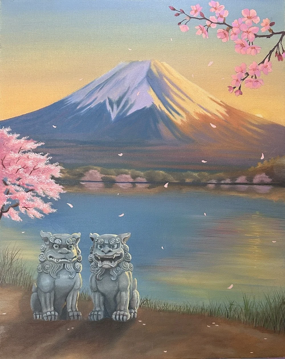 A painted landscape scene featuring Mount Fuji in the background with snow on its peak, cherry blossom trees in pink bloom in the foreground and along the middle ground by a lake, two traditional gray stone lion statues in the front, and a calm body 
