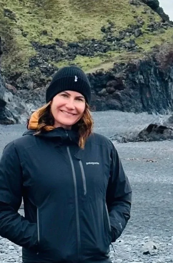 Woman wearing beanie on a beach