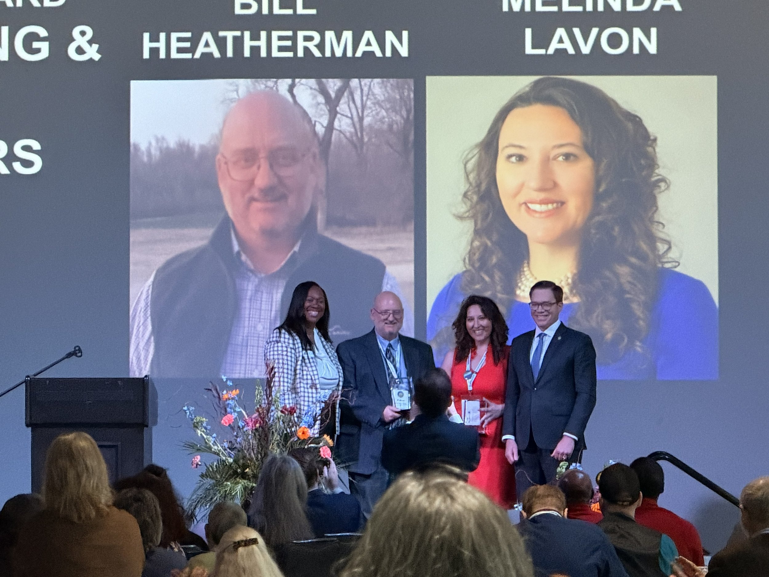 Bill and Melinda receive party building award.jpg