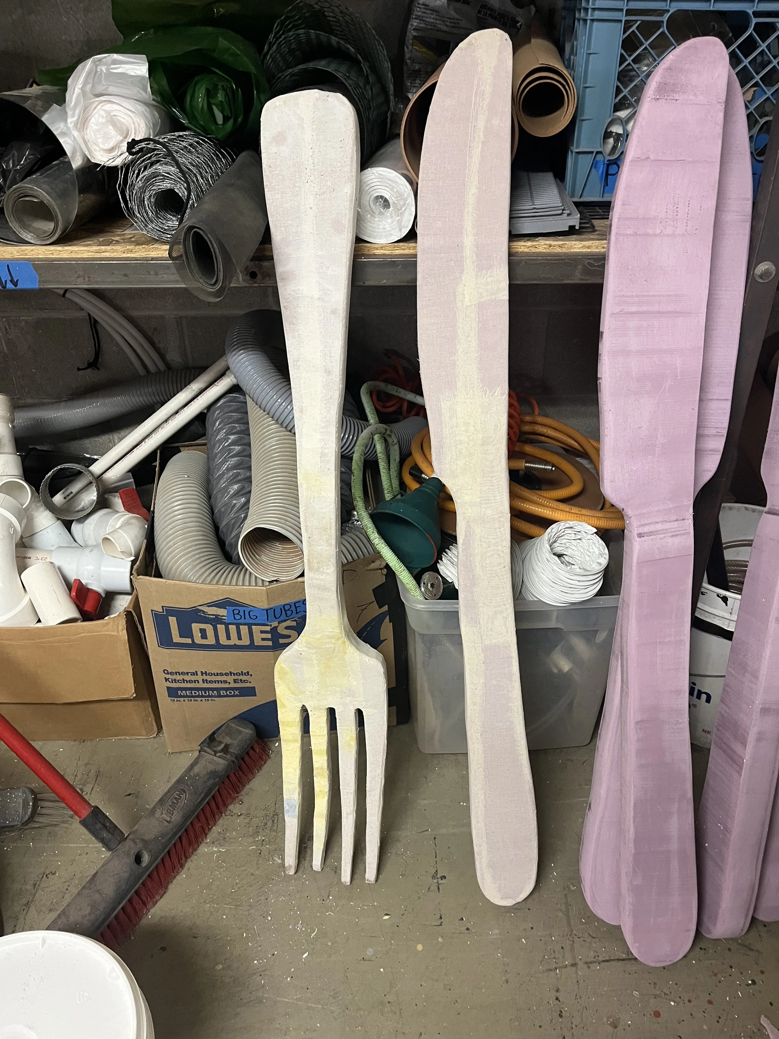 Silverware created out of insulation foam, paper mache, and lightweight spackle. Built for actors to interact with.  