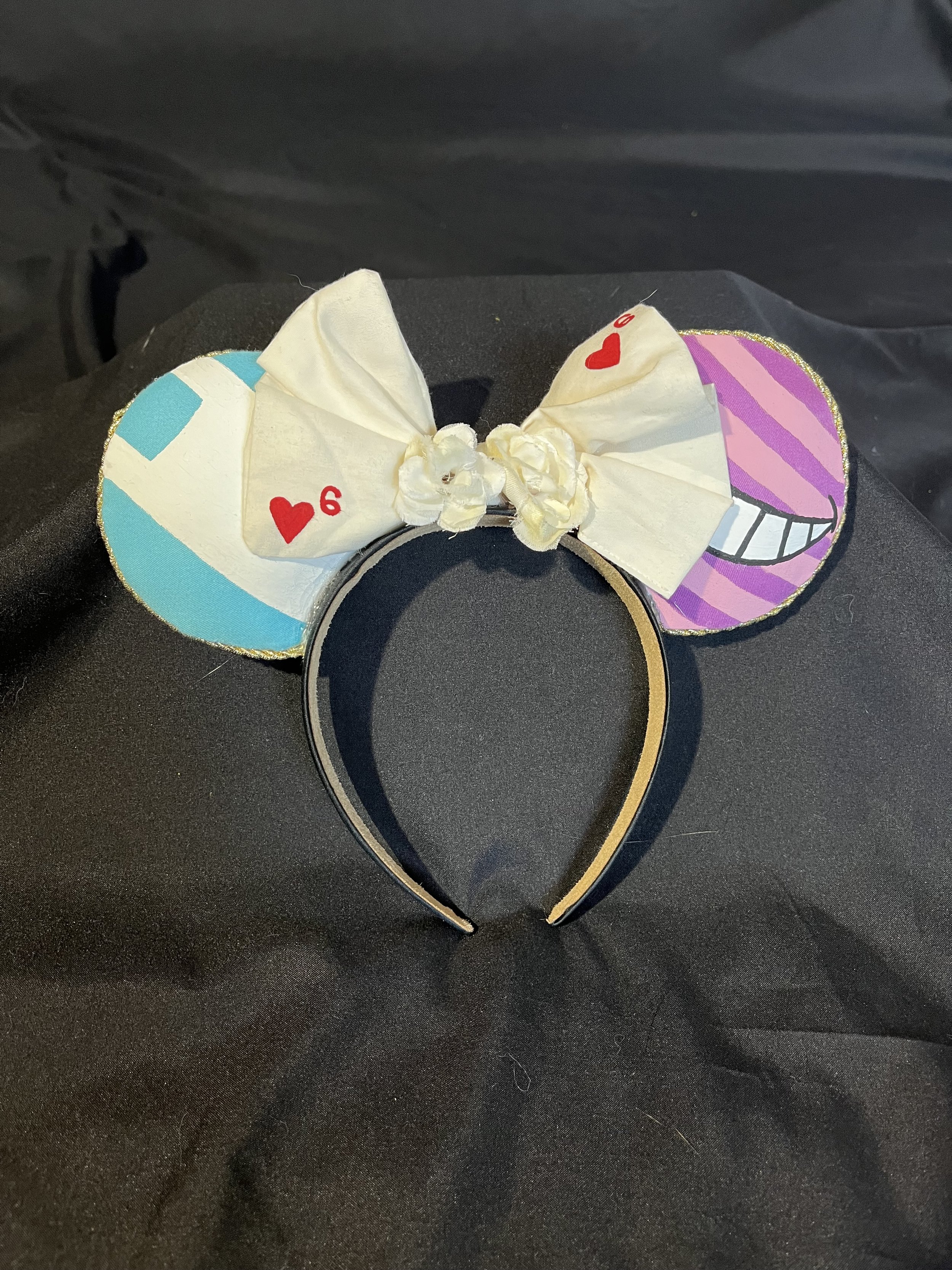 Handmade Disney ears inspired by Disney's Alice and the Cheshire Cat.
