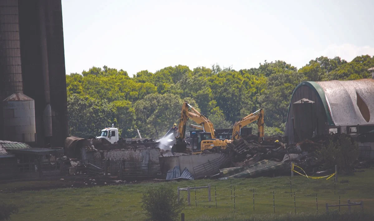 Large fire destroys cattle barn near Sandford