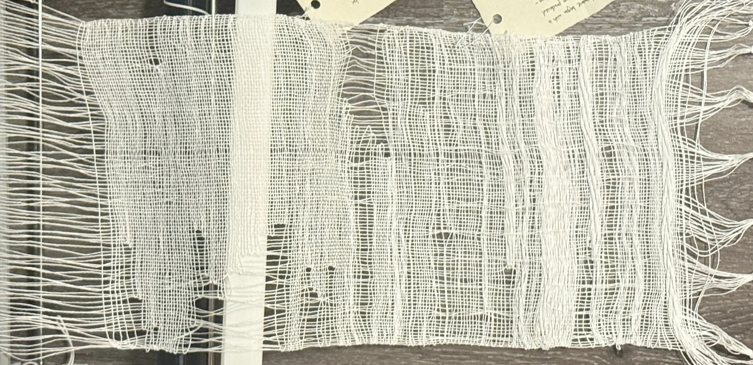 Composite view of all woven cloth from the Hangzhou performances, showing how denser fields, elongated passages, and interruptions varied across the Hangzhou sessions. Photograph by Yuting Zhou, 2026.