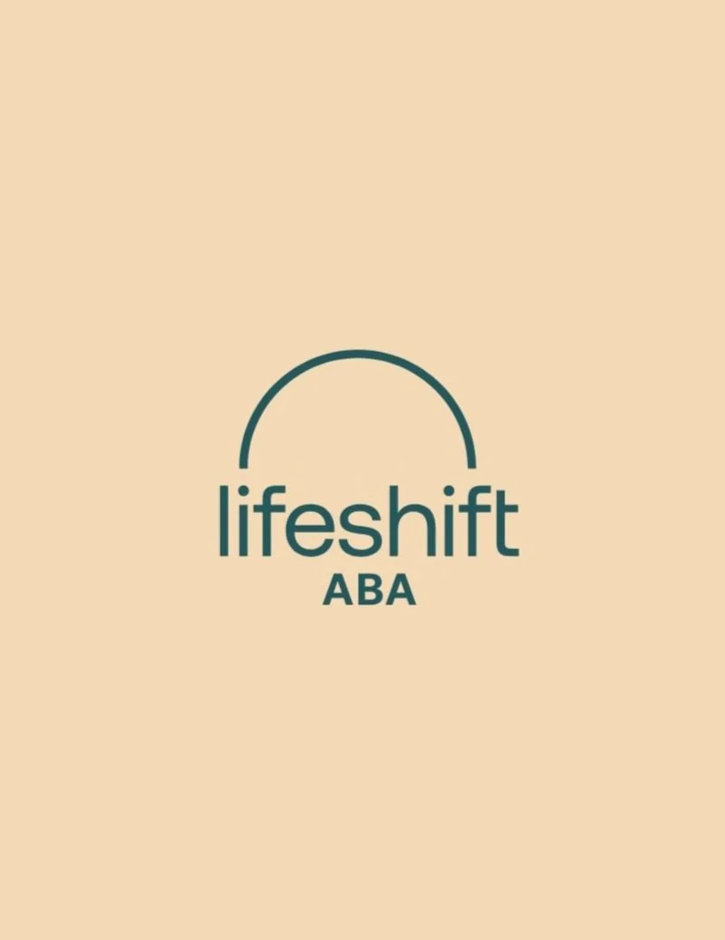 A logo with the words 'lifeshift ABA' and a semi-circular arc above the text, set against a beige background.