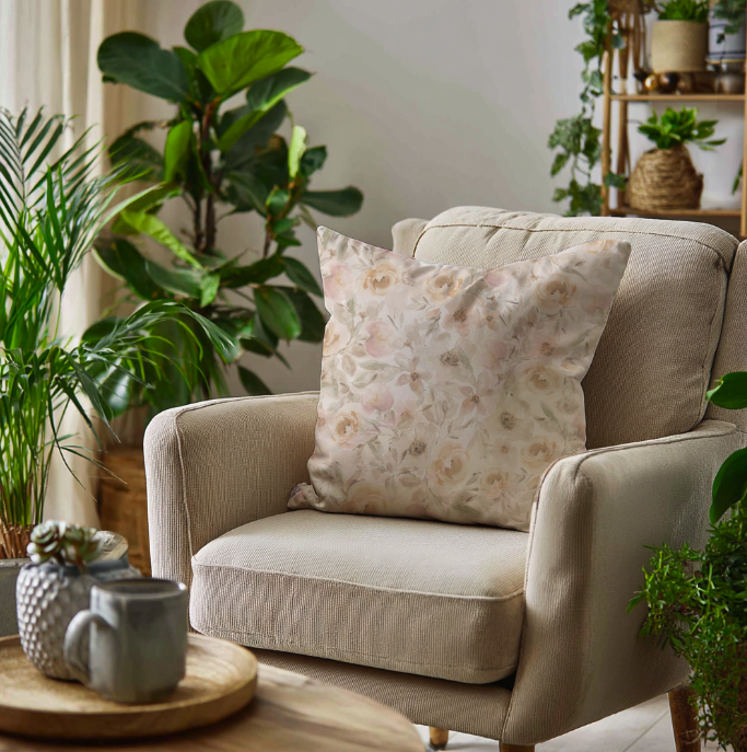 Scatter cushion for living room in light cream with watercolor roses and botanicals on fabric in soft pinks peaches yellows greens and off white cottagecore repeat pattern by Michele Anne Design.png