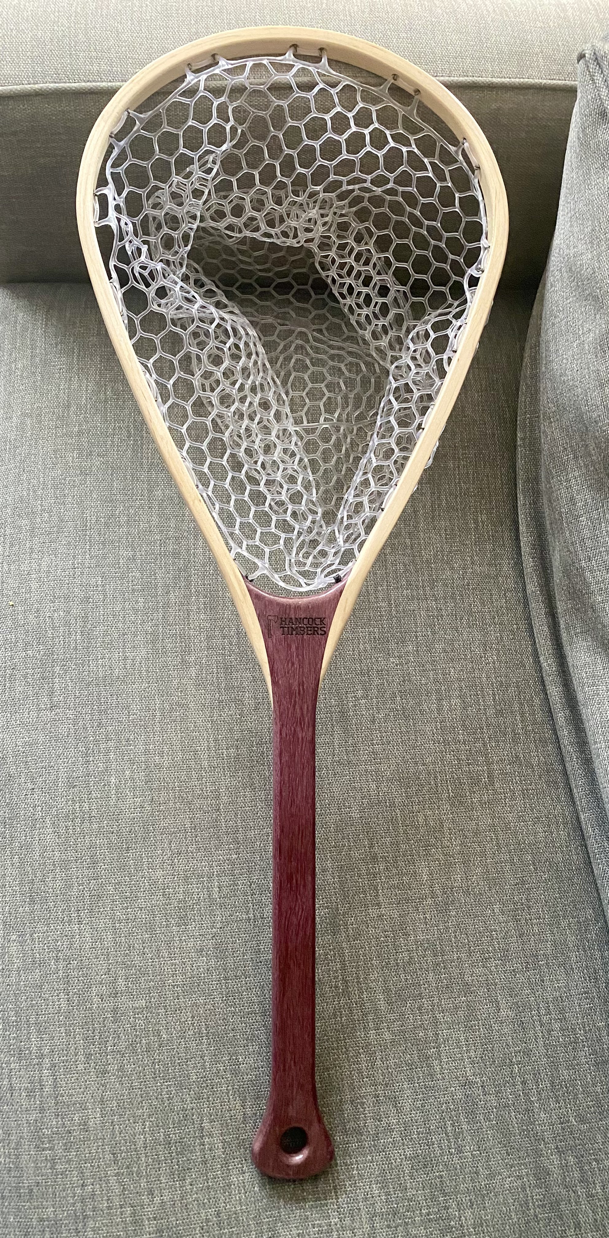 Custom hardwood fly fishing net designed for landing large fish