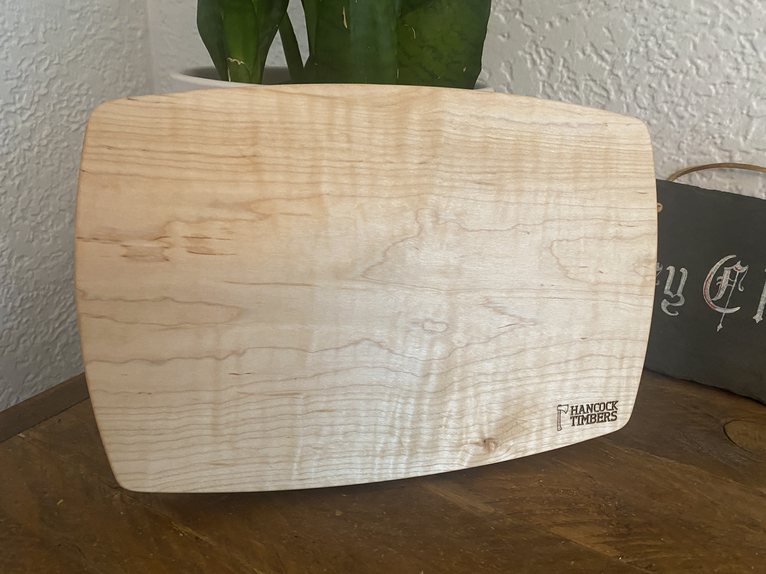 Kitchen Flex hardwood cutting board in maple, medium-size wooden prep board designed for everyday kitchen use and flexible food prep