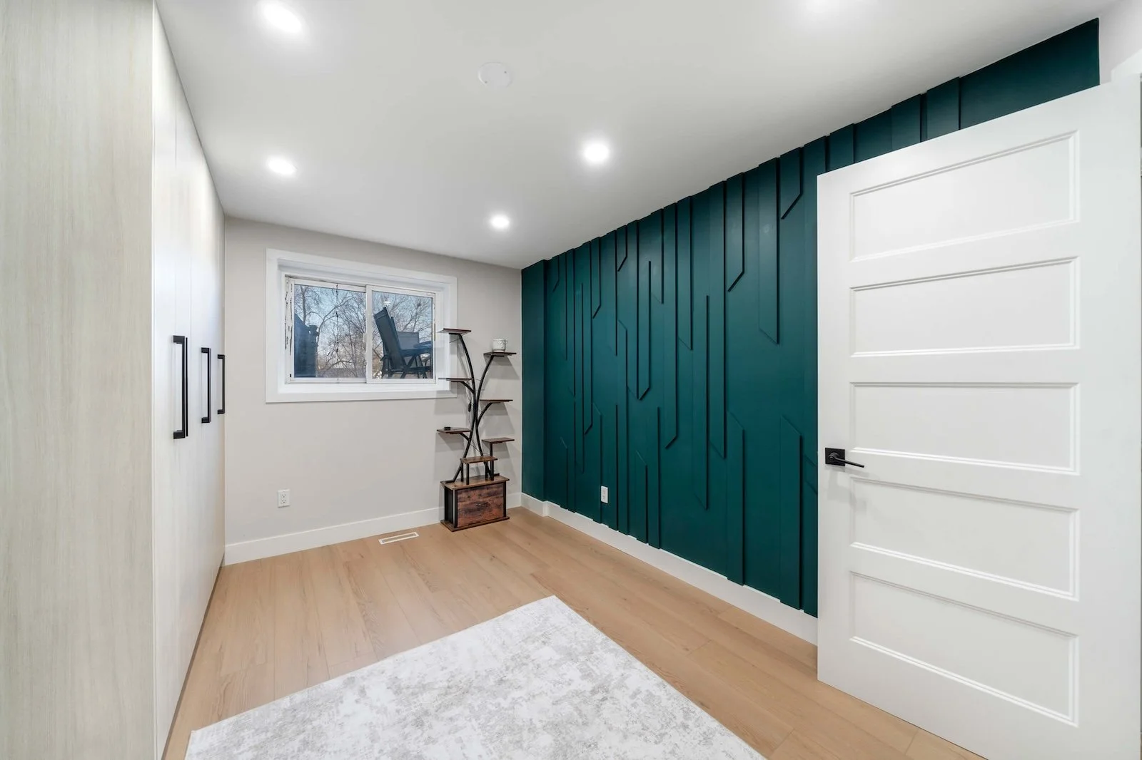basement renovation in oshawa featuring custom modern feature wall angle.jpg