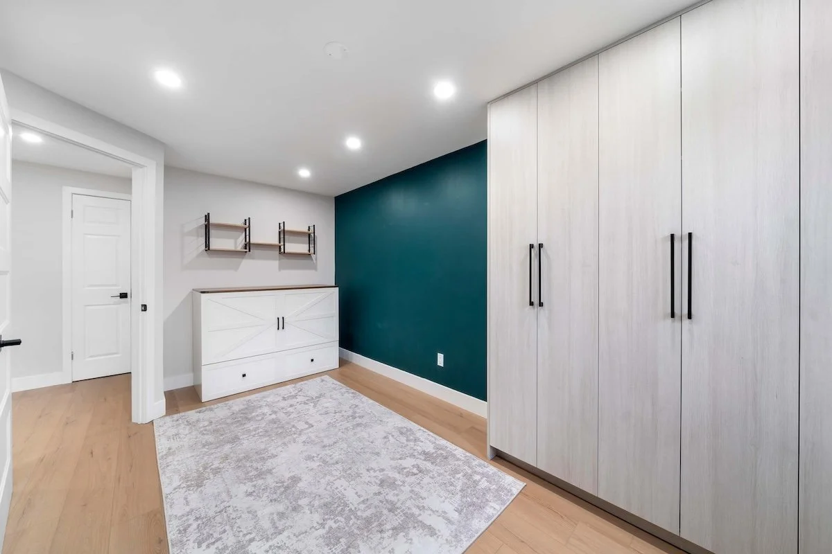 Basement bedroom and closet layout with modern finishes Oshawa renovation
