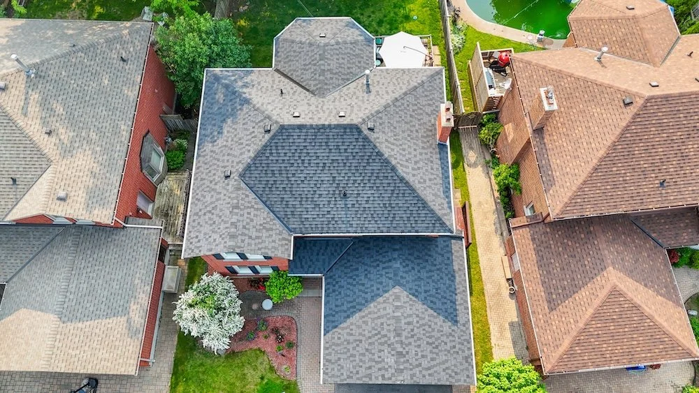 Oshawa pre‑painted louver roof vent detail on new architectural shingles