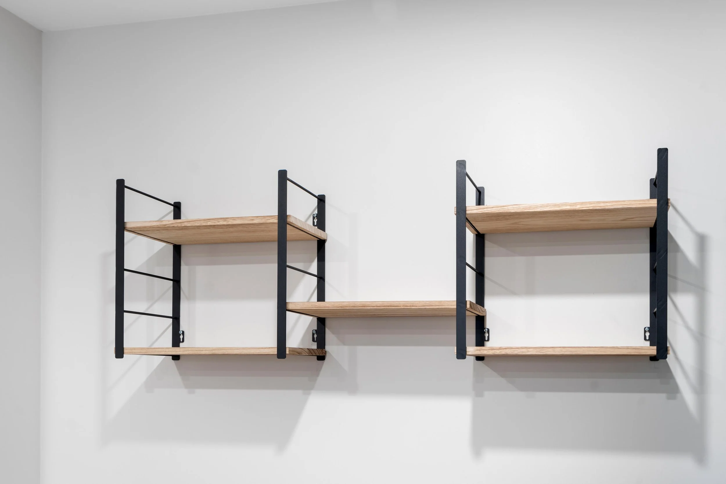 Custom closet storage solution with shelving and compartments in Oshawa renovation