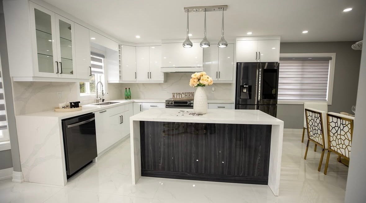 Modern kitchen renovation in Pringle Creek, Whitby, with contemporary cabinets, island, and stylish lighting