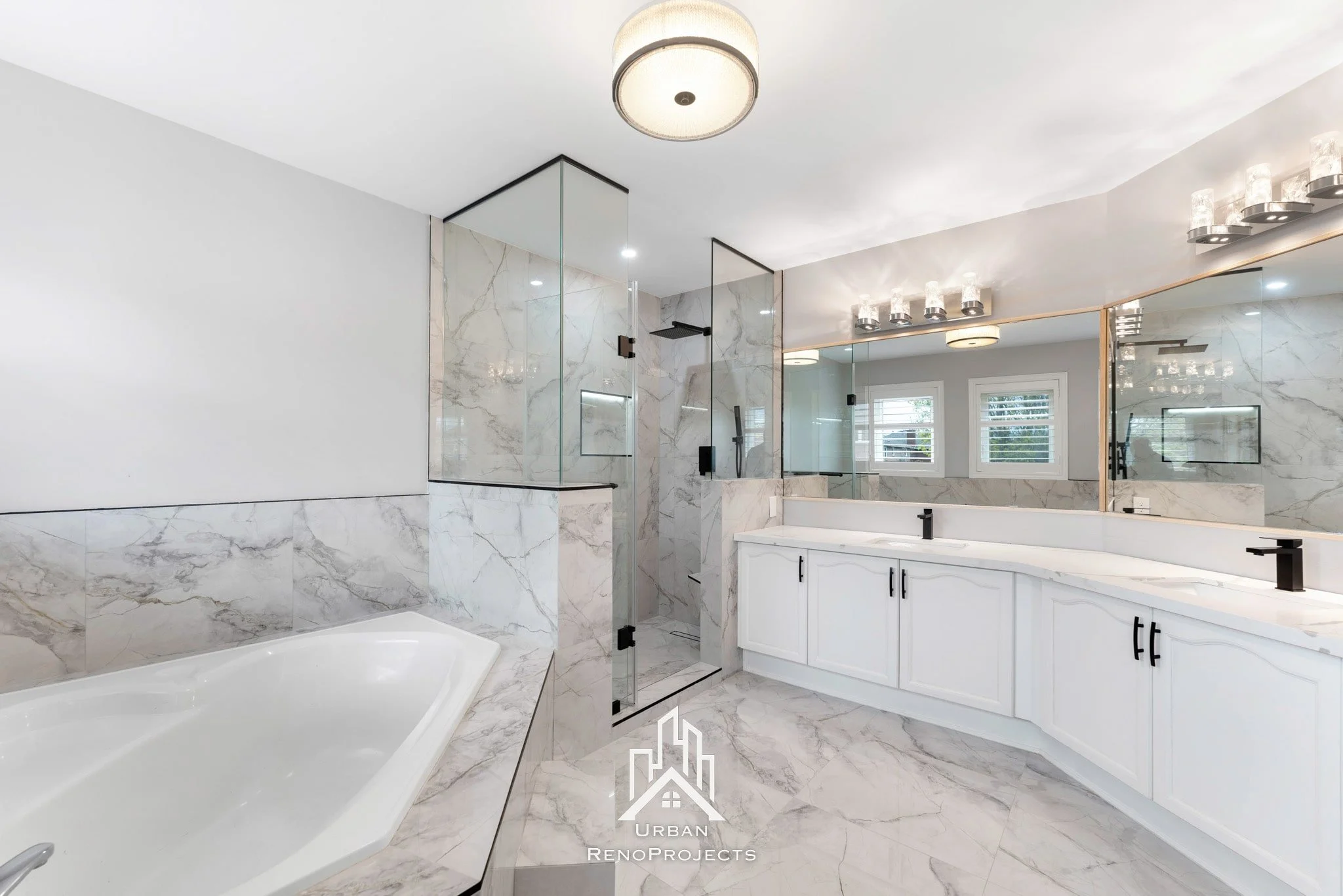Transformed GTA master bathroom featuring a luxurious walk-in shower