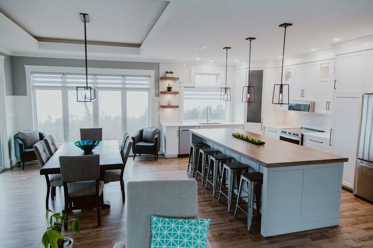 Design-build kitchen renovation showcasing custom cabinetry, large island, and modern finishes completed by a Durham Region contractor.