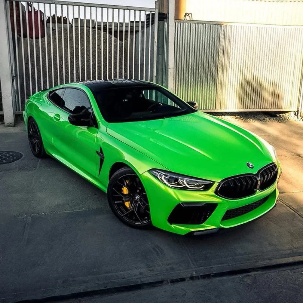 image of a BMW vehicle wrapped in green wrap with gloss finish