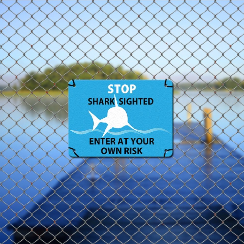 image showing direct print on a metal sign attached to a fence.