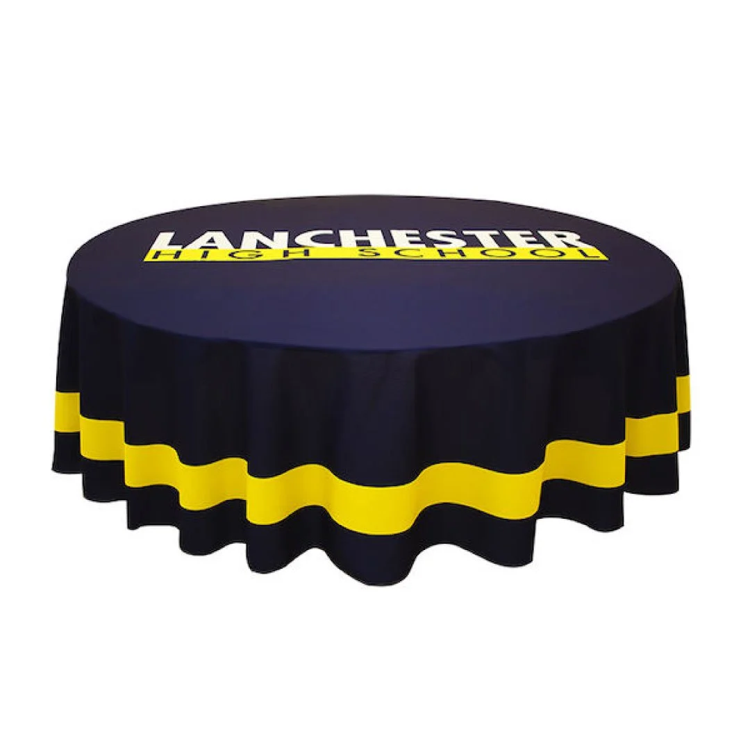 Image of rounded printed table cover covering a short rounded table